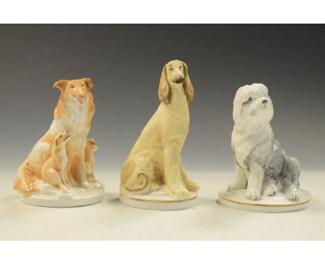 Three Royal Worcester porcelain dogs comprising: Afghan Hound, Old English Sheepdog puppy and Shetland Sheepdog with pups (3)
