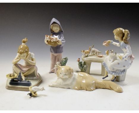 Three Lladro porcelain figure groups featuring cats comprising: 6109 Meal Time, 6102 Mother's Little Helper, and 5474 How You