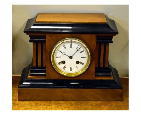 Early 20th Century walnut and ebonised cased mantel clock having white enamel dial  