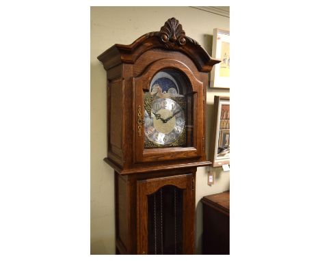 Reproduction longcase clock having brass dial and Westminster, St Michael and Whittington chimes, with gridiron pendulum and 