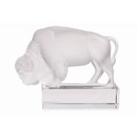 A LALIQUE GLASS BISON PAPERWEIGHT