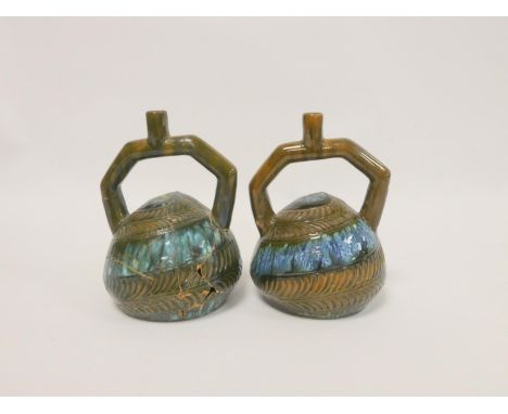 Christopher Dresser (1834-1904). Pair of Linthorpe art pottery twin-handled Peruvian vessels, c1880, with incised swirl decor