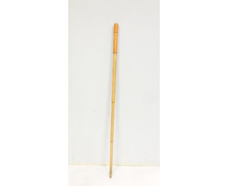 Late 19th/early 20th century bamboo and malacca walking stick, the telescopic shaft opening to reveal a silk umbrella within.