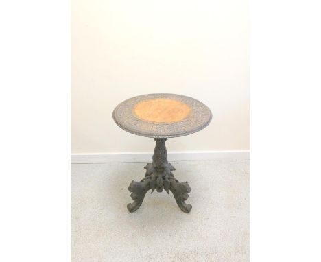 19th century Anglo-Indian carved padouk hardwood circular occasional table, the top bearing a carved border depicting dogs, e