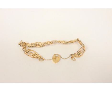 9ct gold gate bracelet. 7g.