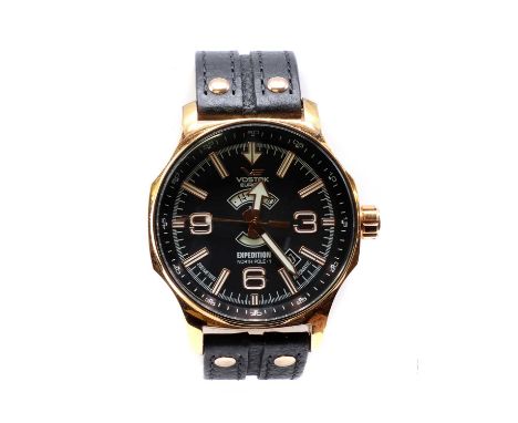 A cased rose gold plated Vostok 'Expedition North Pole 1' automatic strap watch, 46mm diameter with a black dial with centre 