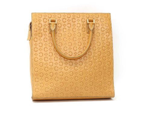 A Celine tan leather blason pattern handbag,dual rolled handles, gold tone hardware, zip top closure opening to reveal intern