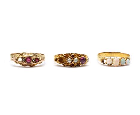 Three gold rings,comprising a gold five stone opal ring, one opal deficient, tested as approximately 9ct gold, a 9ct gold pas