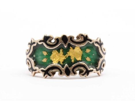 A 9ct gold enamel ring, with roses to a green enamel ground, with black enamel scroll border, to tapered flat section shank, 