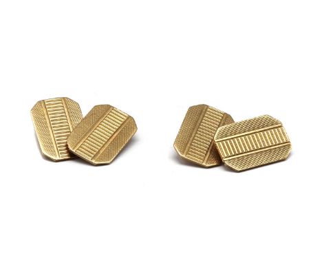 A pair of 9ct gold cufflinks, rectangular faces with canted corners and engine turned decoration, with chain link fittings, B