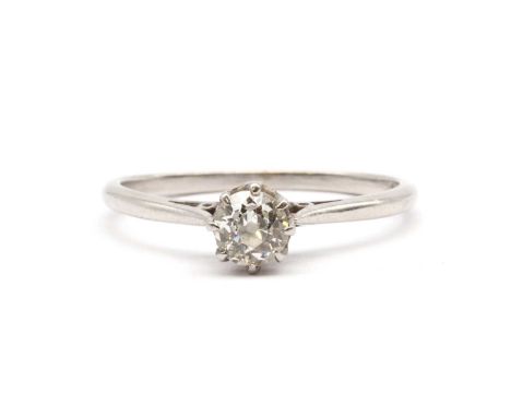 A single stone diamond ring,with an old European cut diamond, claw set, to tapered chenier shoulders and a 'D' section shank,