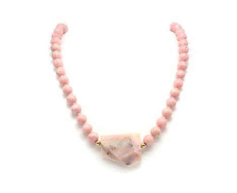 A pink potch opal and rhodochrosite bead necklace, with a freeform pink potch opal pendant, with gold spacer bead either side