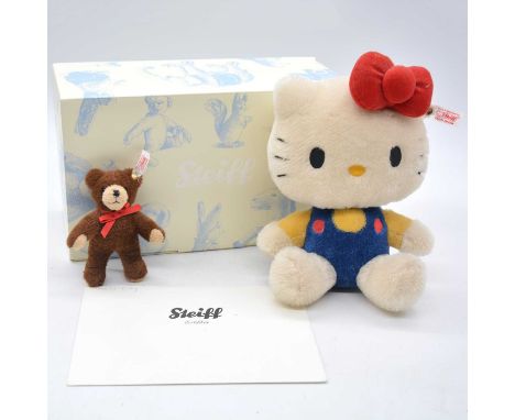 Steiff Germany teddy bear, EAN 682216 'Hello Kitty 40th anniversary', 22cm, 2013, limited edition no.256 of 1500, with 12cm b