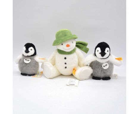 Steiff teddy bears, three including EAN 690181 'The Snowman', 27cm; EAN 057090 'Flaps' penguin, 18cm; EAN 057144 'Flaps' peng