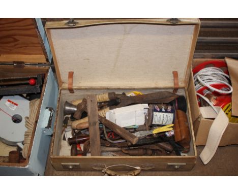 A suitcase and contents of various hand tools
