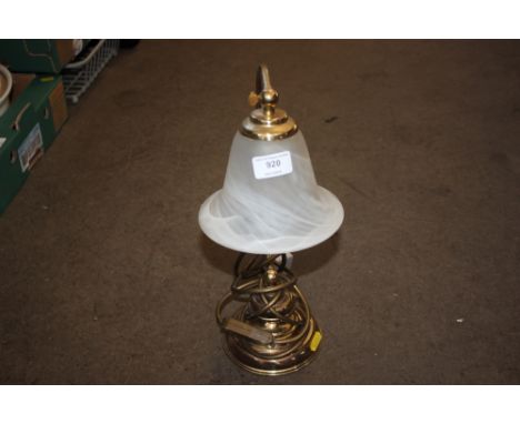 A brass table lamp 