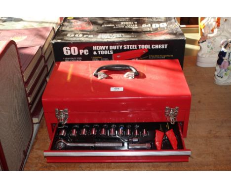 A heavy duty steel tool chest and contents 