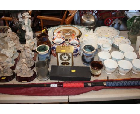 A large quantity of decorative china; ornaments; iron stone ware jugs; Royal Stuart teaware; brass cased mantel clock etc.  