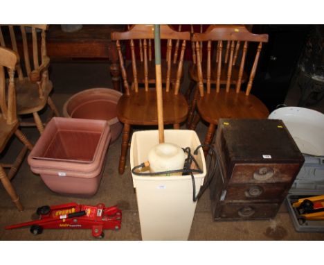 A plastic bin and contents of various hand tools