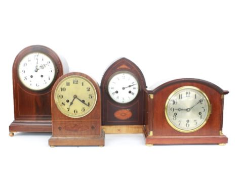 Mahogany three train mantel clock striking on five gongs, the 6" silvered dial within a rounded arched pillared case, 10" hig