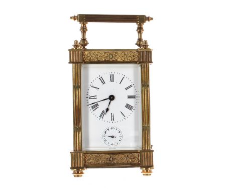 Carriage clock timepiece with alarm, the movement striking on a bell recessed in the base, within an ornate fluted pillared a