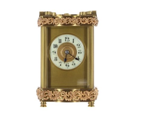 Carriage clock striking on a gong, the 1.25" cream chapter ring within a gilt mask and ornate Doucine style case with raised 
