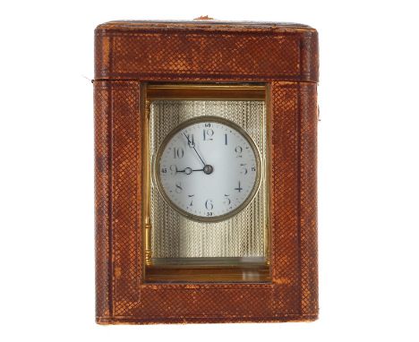 Repeater carriage clock striking on a gong, the movement back plate stamped no. 2662, the 2.25" white dial within a silvered 