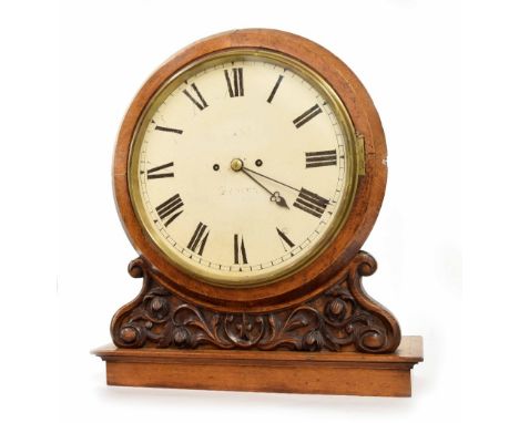 Oak double fusee gallery clock, the 12" white dial indistinctly signed over a bracket carved with scrolling foliage and flowe