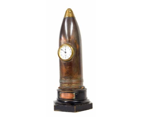 Historically interesting novelty mantel clock timepiece constructed using an original bronze artillery shell, The Ansonia 8-d