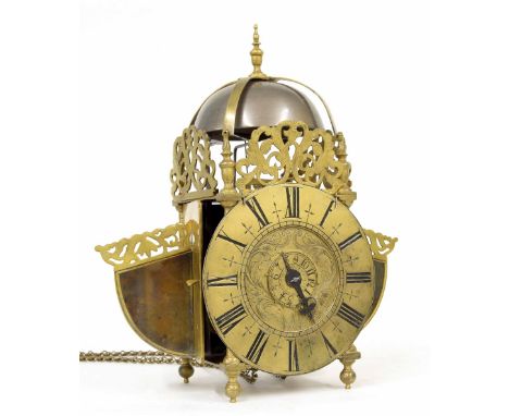 Interesting English verge brass hook and spike winged lantern clock, the 7.25" brass dial enclosing a foliate engraved centre