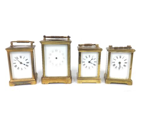 Richard &amp; Co carriage clock in need of restoration, 7.25" high; also three other various smaller carriage timepieces (4)