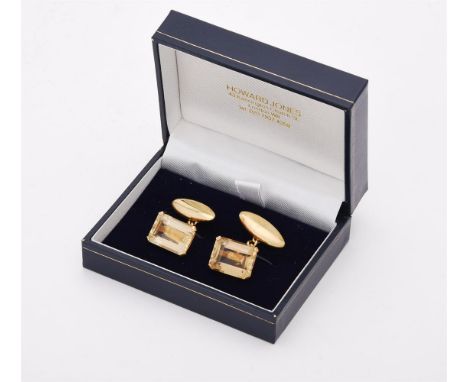 
	
		A pair of citrine and gold coloured cufflinks, the step cut citrines with canted corners, 1.6cm long, in four claw gold 