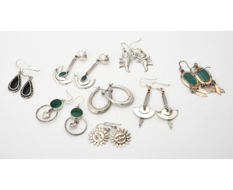 
	
		A collection of silver coloured earrings, the various shaped ear pendants with hardstone accents, mostly stamped 925, ap