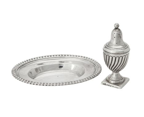 
	
		A George III silver shaped oval dish by Robert Hennel, London 1810, 11.5cm (4 1/2imn) long; and a Victorian urn shaped p