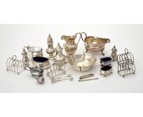 
	
		A collection of silver items, to include: a three piece cruet set, maker's mark JCL, London 1937, comprising an oval sal