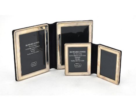 
	
		Two silver mounted folding double photo frames by Kitney &amp; Co., London 2006 and 2007, with beaded borders, the talle