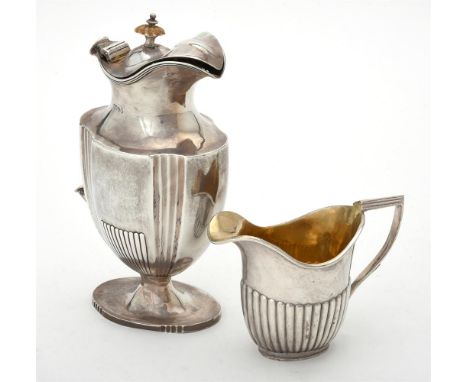 
	
		Y&nbsp;A Victorian silver shaped oval and fluted jug by Robert Harper, London 1883, with an ivory finial and on an oval 