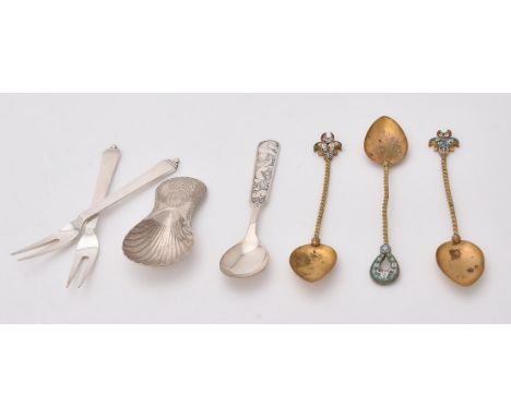 
	
		A George III silver caddy spoon by Charles Hougham, London 1785, engraved with a bow and HM, 8cm (3in) long; two silver 