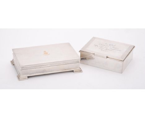 
	
		A silver mounted rectangular cigarette box, maker's mark obscured, Birmingham 1934, retailed by Asprey, with engine turn