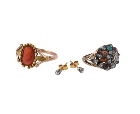
	
		Y&nbsp;A small collection of jewellery, comprising an antique carved coral ring, the oval coral panel carved with the bu