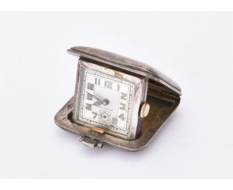 
	
		Sapho, 
		Silver purse watch, no. S4396, circa 1934
		Movement: Manual wind, manual wind, 15 jewels
		Case: Silver hinge