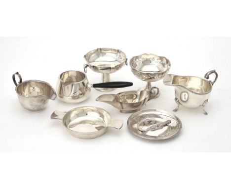 
	
		A collection of silver items, to include: an oval sauce boat by William Aitken, Birmingham 1916, with a gadrooned border