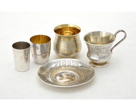 
	
		A Russian silver cup and saucer by Ivan Sveshnikov, Moscow 1883, assay master Semen Shebanov, 84 zolotniki, the thistle 
