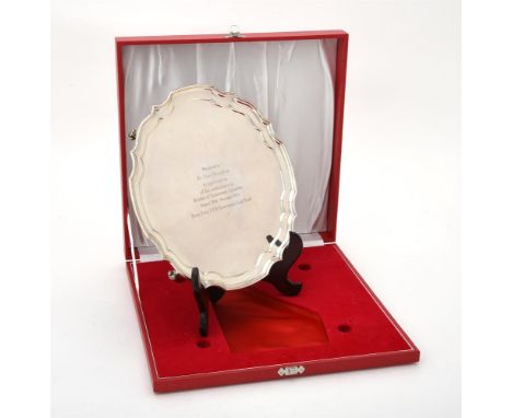 
	
		A silver shaped circular salver by J. B. Chatterley &amp; Sons Ltd., Birmingham 1988, with a raised moulded border, engr