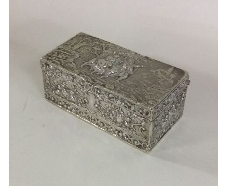 A heavy cast silver snuff box decorated with figures to hinged top. Chester. By BM. Approx. 70 grams. Est. £100 - £150.