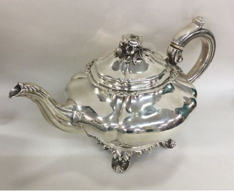 A good Georgian silver melon shaped teapot. London 1833. By JA&amp;JA. Approx. 680 grams. Est. £500 - £600.