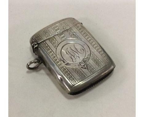 A heavy engine turned silver vesta case. Birmingham. Approx. 30 grams. Est. £20 - £30.