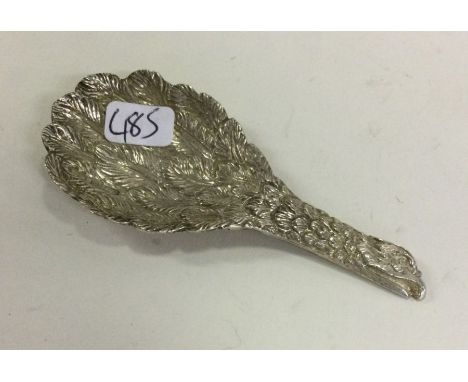 A modern cast silver eagle wing caddy spoon. London. By CM Ltd. Approx. 24 grams. Est. £30 - £50.
