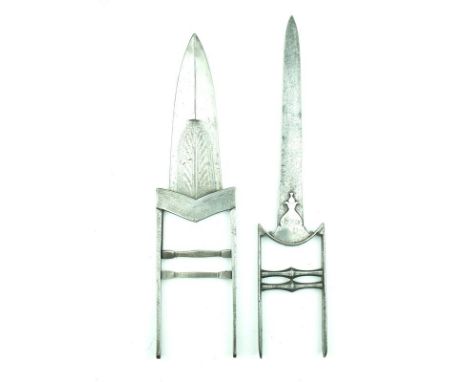 A Scissors Katar, of characteristic form with traces of silver damascene decoration, together with a late 18th Century Katar,