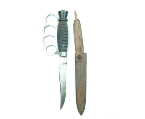 A First World War private purchase knuckle knife, 12.75cm clipped back blade, characteristic white metal knuckle duster hilt 